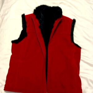 Red with black faux fur zip up vest, side pockets, size medium.